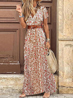 Robe longue rouge à fleurs, col en V et manches courtes