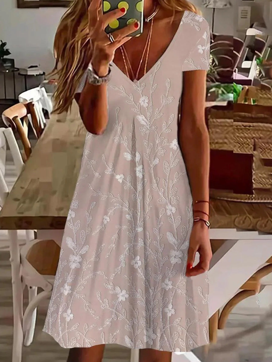 Robe courte rose à col en V et manches courtes