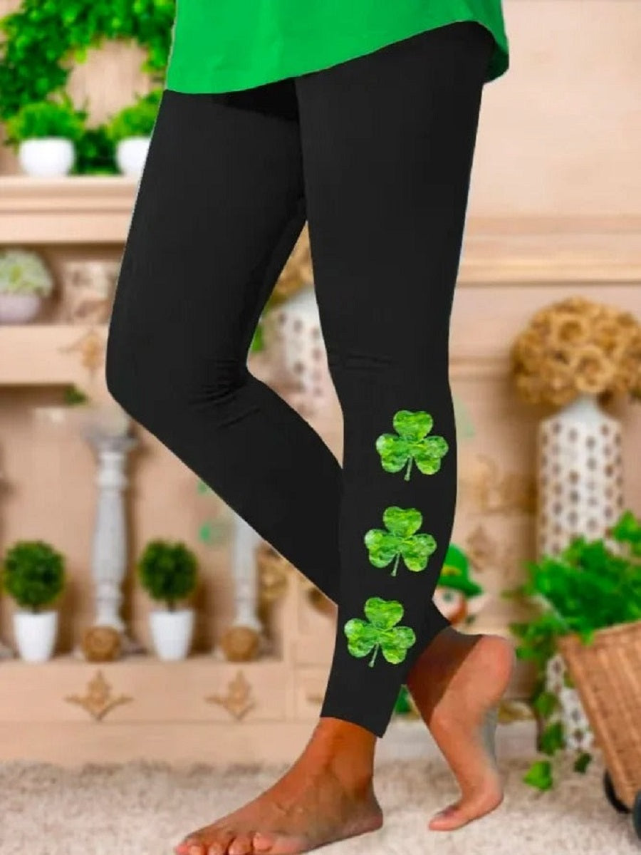 Schwarze Leggings mit lässigem Vierblatt-Print