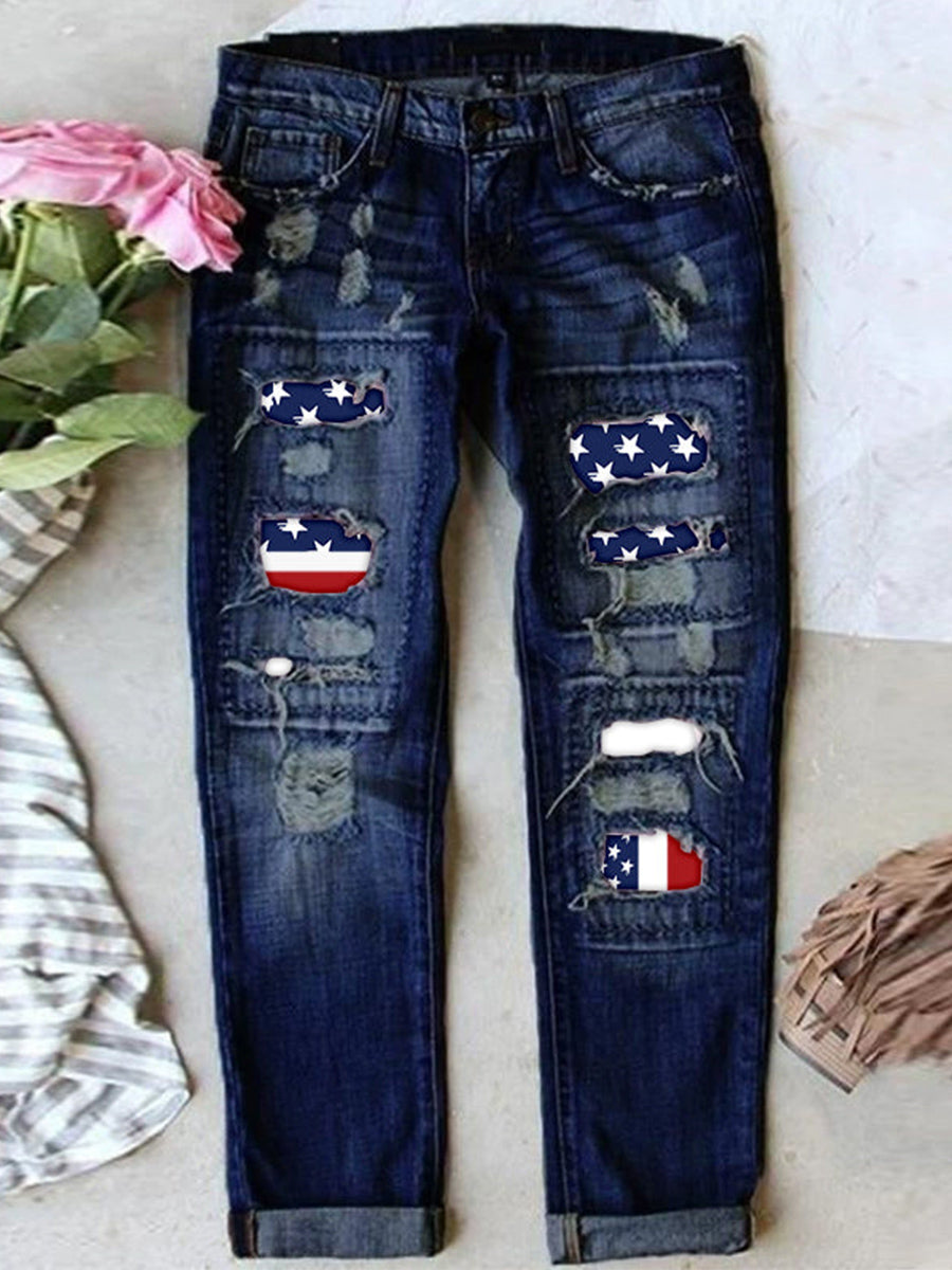 Jean stretch déchiré à ourlet brut effiloché et usé