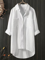 Haut ample à col en V en coton et lin uni