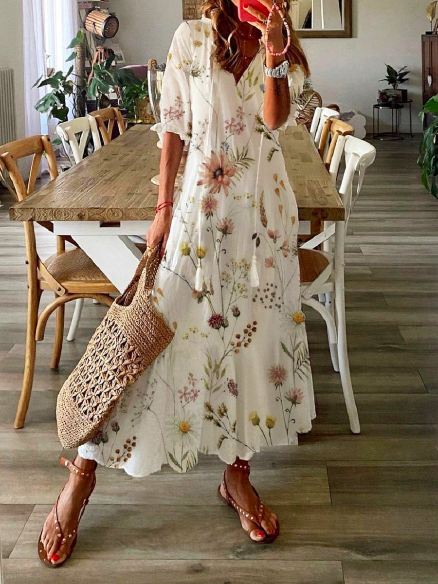 Robe blanche décontractée à col en V et imprimé floral, manches courtes