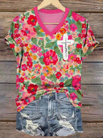 Haut rose à manches courtes et col en V.