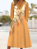 Robe midi à manches longues et col en V pour femme, imprimée de fleurs et ornée de dentelle.