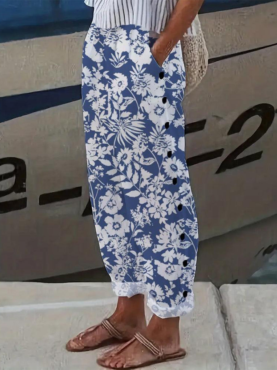 Hose mit blauem Blumenmuster und Seitentaschen