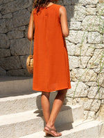 Robe mini sans manches à poches amples