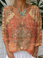 Lässiges, locker sitzendes Langarm-T-Shirt mit Ethno-Print und V-Ausschnitt