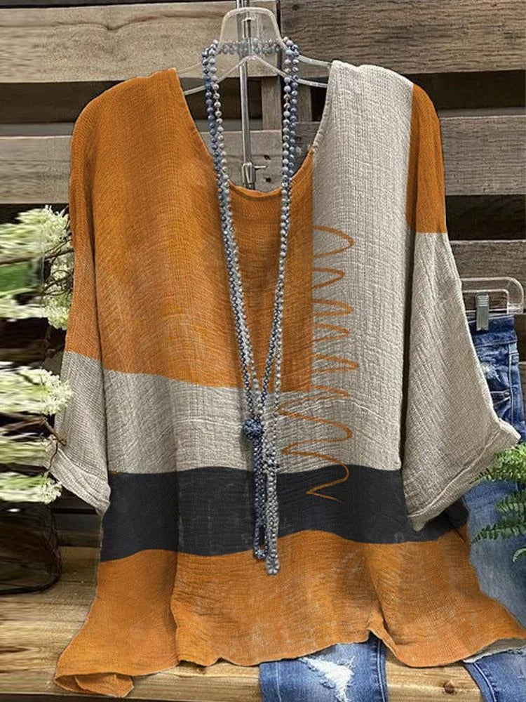 Chemisier jaune décontracté à col rond et manches longues, color block.