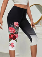 Schwarze Capri-Leggings mit Blumenmuster