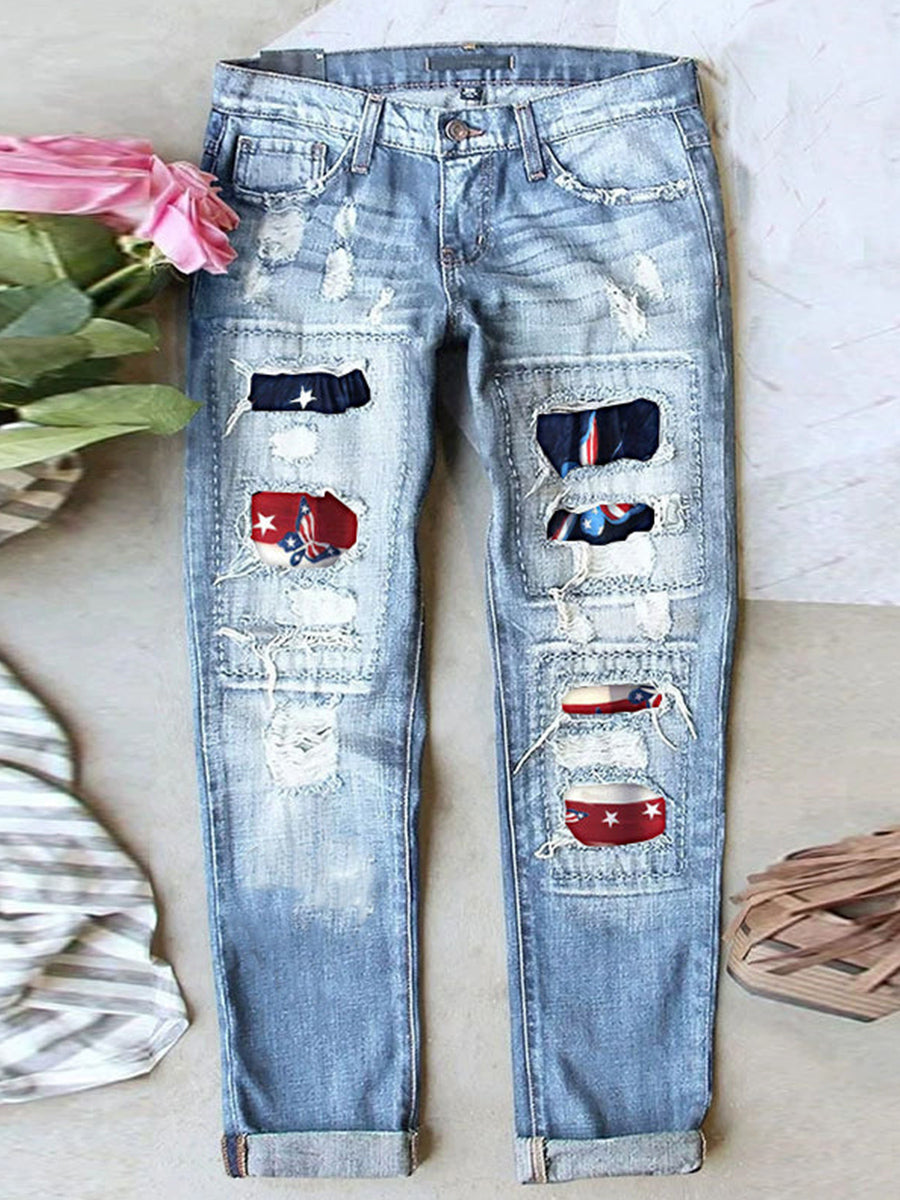 Jean stretch déchiré à ourlet brut effiloché et usé