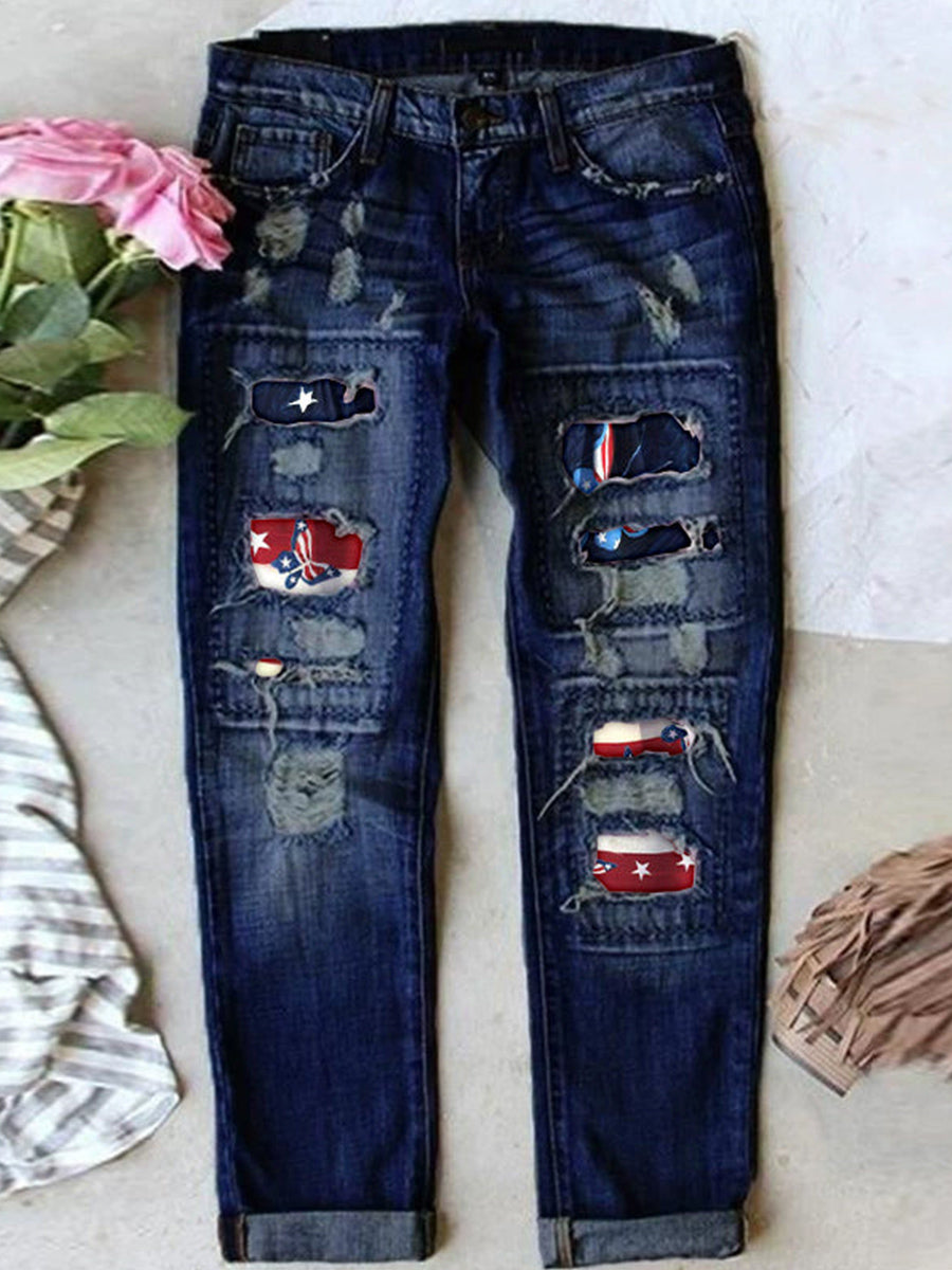 Jean stretch déchiré à ourlet brut effiloché et usé