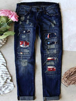 Jean stretch déchiré à ourlet brut effiloché et usé