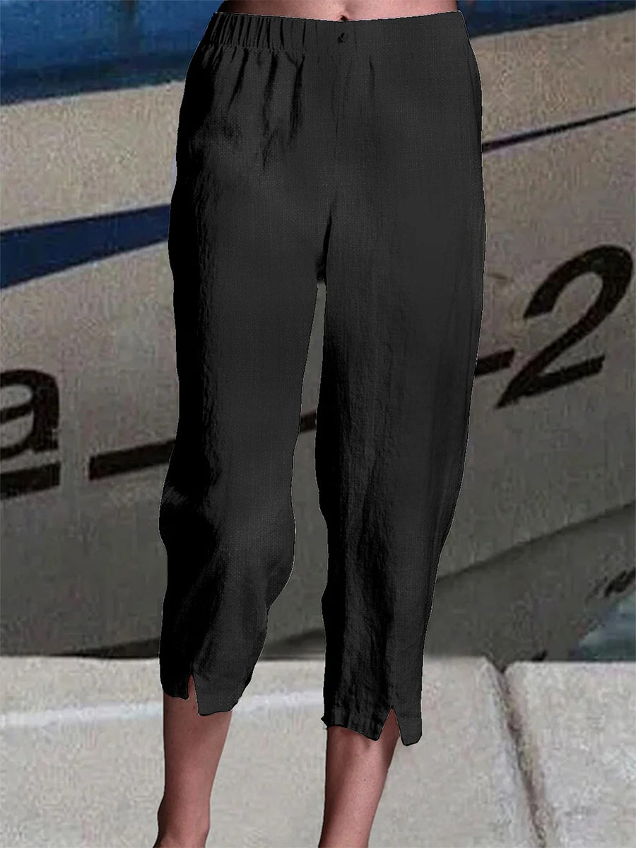 Pantalon capri uni en lin, coupe ample et taille élastique, idéal pour l'été.