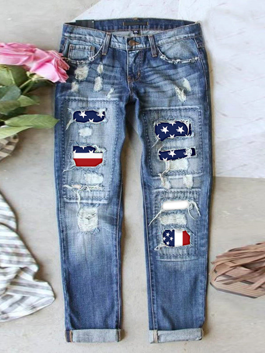 Jean stretch déchiré à ourlet brut effiloché et usé