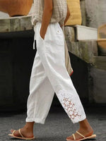 Lässige weiße Hose mit elastischem Bund und Spitze