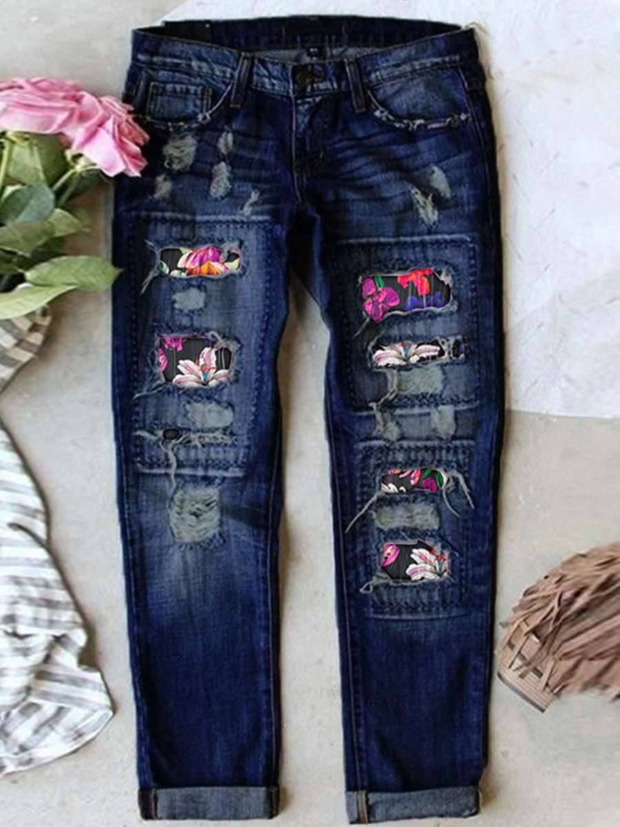 Jean stretch déchiré à ourlet brut effiloché et usé