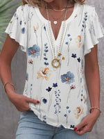 Haut à col V et manches courtes à imprimé floral